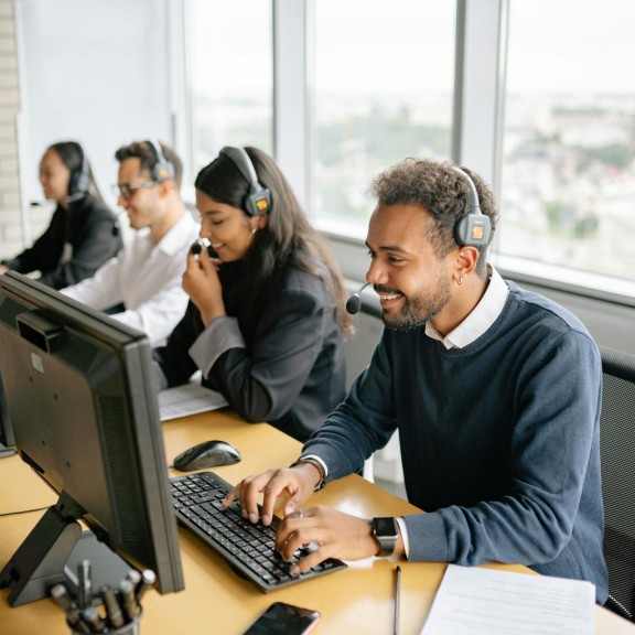 Call Center Staff at Computers