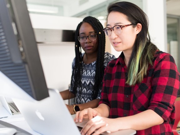 Two Women at a Computer