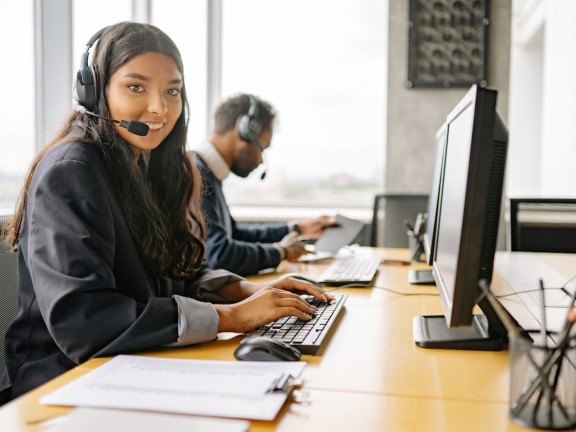 Women at Call Center Desk