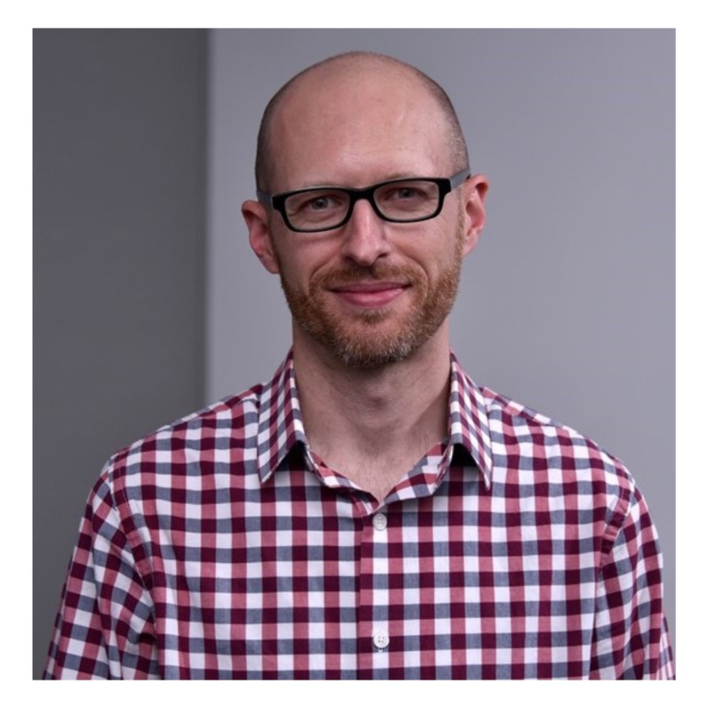 Jeremy Manus tech forward speaker headshot with white background