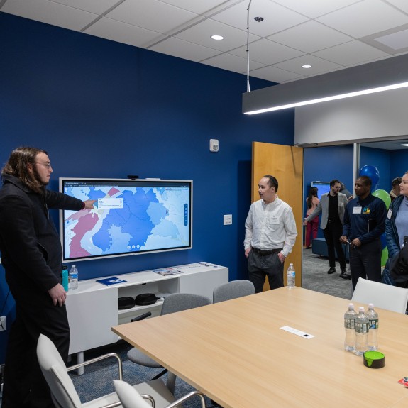 Group Looking at Computer Screen
