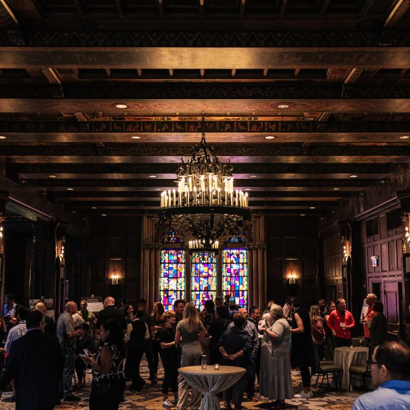 Historic Hotel Ballroom Full of Networking Attendees