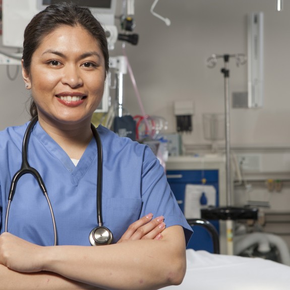 Female Nurse Looking at the camera in scrubs