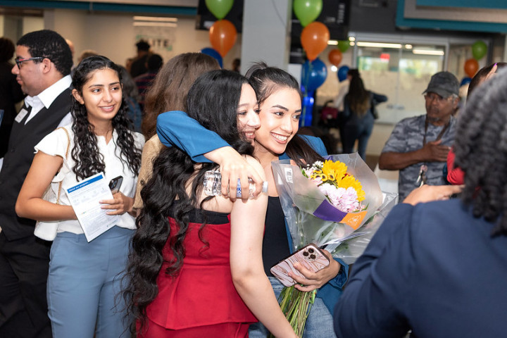 Two women hugging in celebration